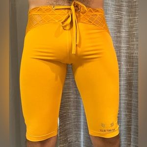 Orange knee length lace up shorts